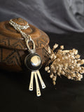 Pendentif d'Ébène et d'Argent