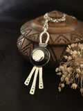 Pendentif d'Ébène et d'Argent