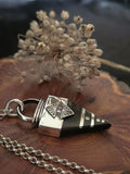 Pendentif d'Ébène et d'Argent