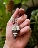 Pendentif d'Ébène et d'Argent