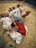 Pendentif corail rouge et cauris
