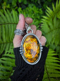 Pendentif ambre / tigre