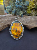 Pendentif ambre / tigre