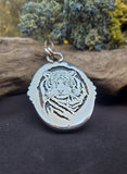 Pendentif ambre / tigre