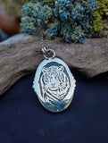 Pendentif ambre / tigre