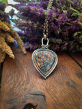 Pendentif calcedoine cuprifere double face